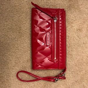 Red patent leather Coach wristlet